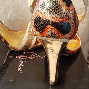 Baby Phat Gold platform stilettos